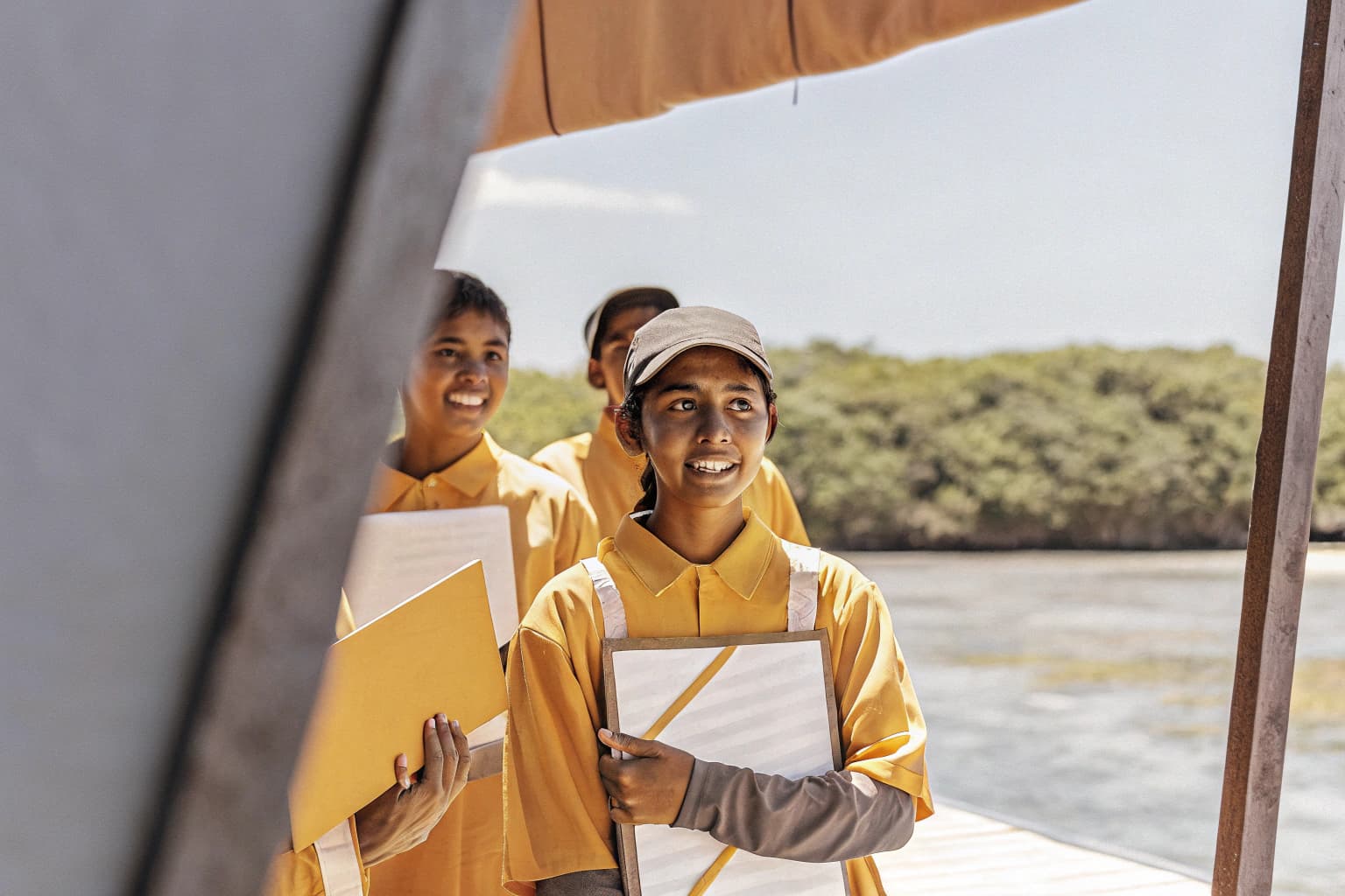 Group of youth reef rangers holding certificates