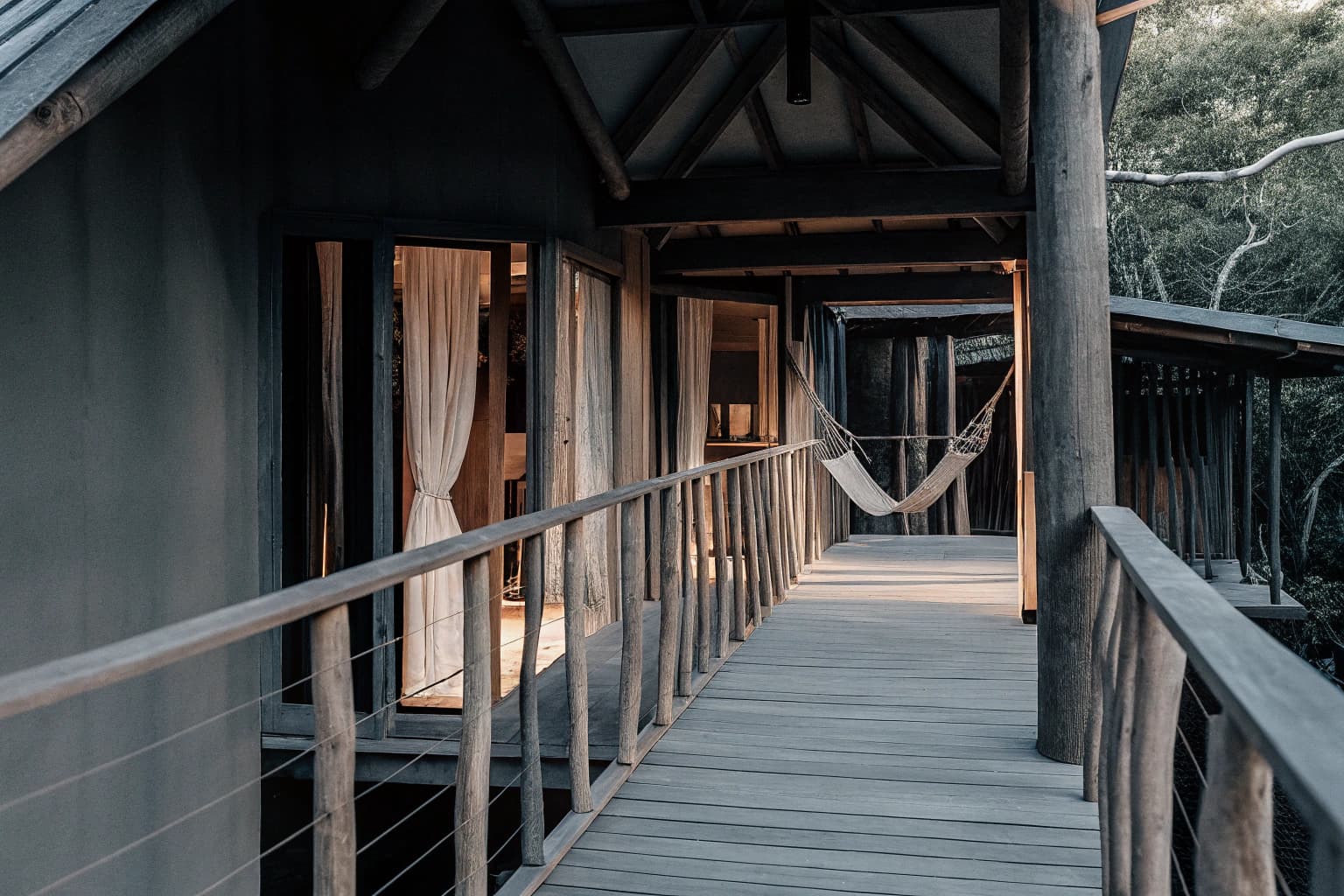 Stilted villa above rainforest floor